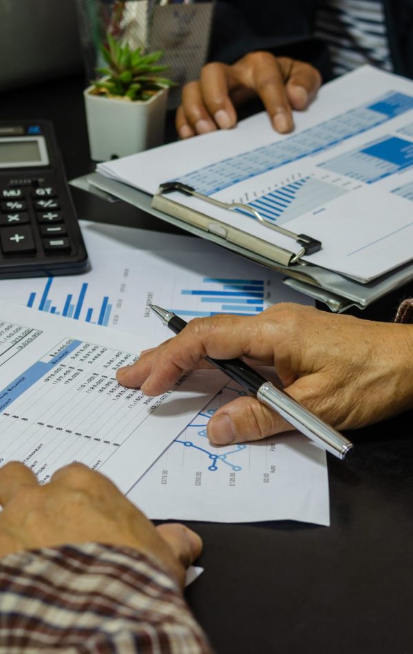 business meeting people analysis report cost graph and chart.